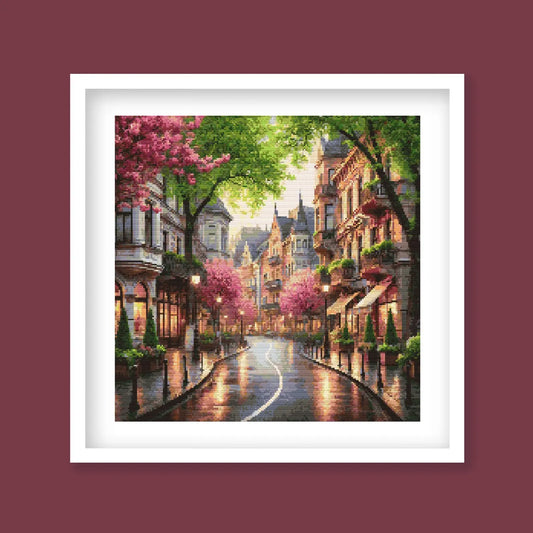 Cityscape Spring Lane Cross Stitch Pattern – Vibrant Pink Trees and Charming Street Scene Embroidery Pattern. Digital PDF Download.